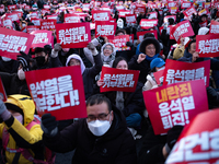 Citizens gather in Yeouido, South Korea, on December 7, 2024, to demand the impeachment and resignation of President Yoon Suk Yeol. Yoon's a...