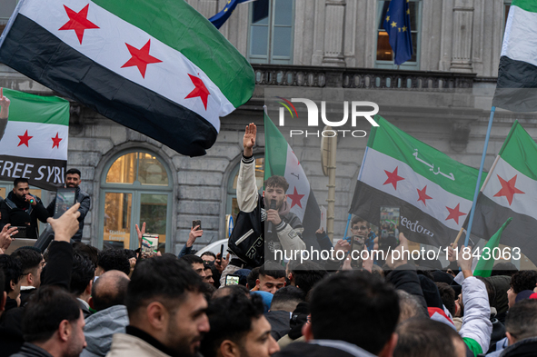 A representation of the Syrian people waves Syrian flags and chants for freedom, demonstrating in front of the European Parliament in Brusse...