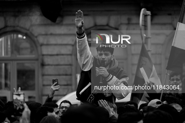 A representation of the Syrian people waves Syrian flags and chants for freedom in front of the European Parliament in Brussels, Belgium, on...