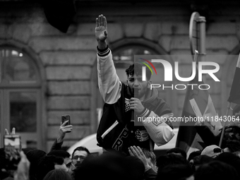 A representation of the Syrian people waves Syrian flags and chants for freedom in front of the European Parliament in Brussels, Belgium, on...