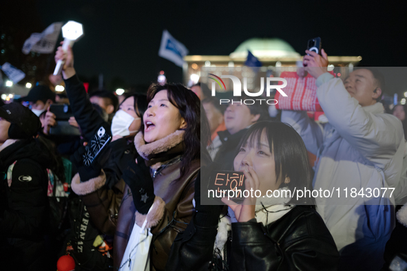 Nearly one million citizens gather in front of the National Assembly in Yeouido, Seoul, South Korea, on December 7, 2024, in support of impe...