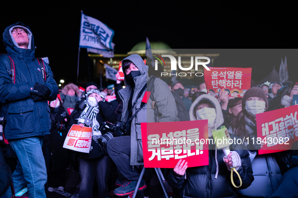 Nearly one million citizens gather in front of the National Assembly in Yeouido, Seoul, South Korea, on December 7, 2024, in support of impe...