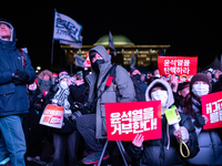 Nearly one million citizens gather in front of the National Assembly in Yeouido, Seoul, South Korea, on December 7, 2024, in support of impe...