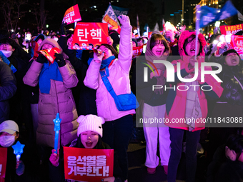 Nearly one million citizens gather in front of the National Assembly in Yeouido, Seoul, South Korea, on December 7, 2024, in support of impe...