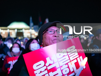 Nearly one million citizens gather in front of the National Assembly in Yeouido, Seoul, South Korea, on December 7, 2024, in support of impe...