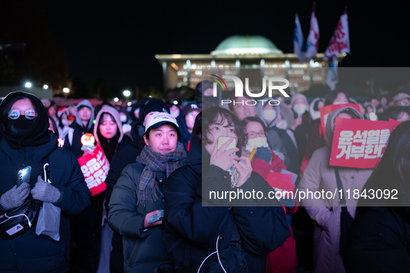 Nearly one million citizens gather in front of the National Assembly in Yeouido, Seoul, South Korea, on December 7, 2024, in support of impe...