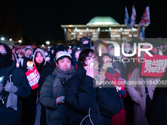 Nearly one million citizens gather in front of the National Assembly in Yeouido, Seoul, South Korea, on December 7, 2024, in support of impe...