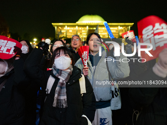 Nearly one million citizens gather in front of the National Assembly in Yeouido, Seoul, South Korea, on December 7, 2024, in support of impe...