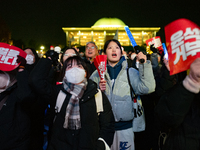 Nearly one million citizens gather in front of the National Assembly in Yeouido, Seoul, South Korea, on December 7, 2024, in support of impe...