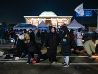 Nearly one million citizens gather in front of the National Assembly in Yeouido, Seoul, South Korea, on December 7, 2024, in support of impe...