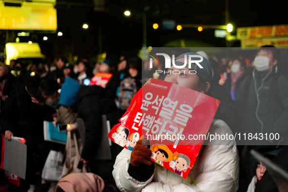 Supporters of President Yoon Suk-yeol's impeachment shed tears after the motion is rejected in the National Assembly. On December 7, 2024, i...