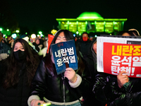 Supporters of President Yoon Suk-yeol's impeachment shed tears after the motion is rejected in the National Assembly. On December 7, 2024, i...