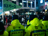 The police set up barricades and block access in front of the People Power Party's central headquarters. Nearly one million citizens gather...