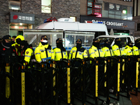 The police set up barricades and block access in front of the People Power Party's central headquarters. Nearly one million citizens gather...