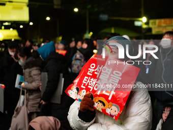 Supporters of President Yoon Suk-yeol's impeachment shed tears after the motion is rejected in the National Assembly. On December 7, 2024, i...