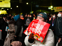 Supporters of President Yoon Suk-yeol's impeachment shed tears after the motion is rejected in the National Assembly. On December 7, 2024, i...