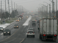 Vehicle traffic is in Mississauga, Ontario, Canada, on December 4, 2024. (