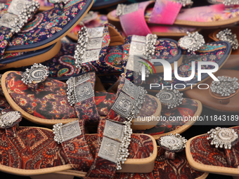 Traditional ladies' sandals from India are displayed at a shop in Woodbridge, Ontario, Canada, on September 7, 2024. (