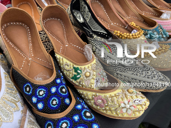 Traditional shoes from India are displayed at a shop in Woodbridge, Ontario, Canada, on September 7, 2024. (