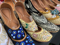 Traditional shoes from India are displayed at a shop in Woodbridge, Ontario, Canada, on September 7, 2024. (