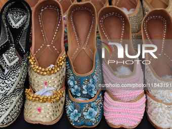 Traditional shoes from India are displayed at a shop in Woodbridge, Ontario, Canada, on September 7, 2024. (