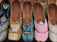 Traditional shoes from India are displayed at a shop in Woodbridge, Ontario, Canada, on September 7, 2024. (