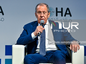 Russian Foreign Minister Sergei Lavrov speaks during the Doha Forum 2024 at Sheraton Grand Doha Resort & Convention Hotel ahead of the 22nd...