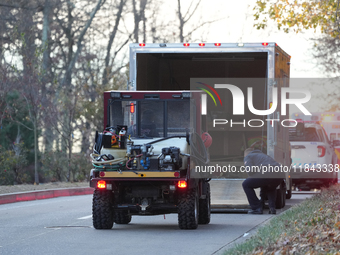 The Washington DC Fire Department battles a brush fire in Rock Creek Park, a National Park in Washington DC, on December 7, 2024. The fire b...