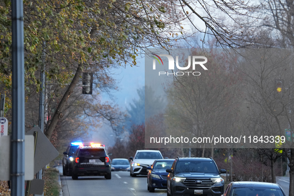 The Washington DC Fire Department battles a brush fire in Rock Creek Park, a National Park in Washington DC, on December 7, 2024. The fire b...