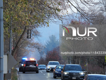 The Washington DC Fire Department battles a brush fire in Rock Creek Park, a National Park in Washington DC, on December 7, 2024. The fire b...