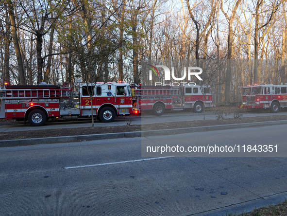 The Washington DC Fire Department battles a brush fire in Rock Creek Park, a National Park in Washington DC, on December 7, 2024. The fire b...