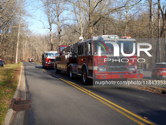 The Washington DC Fire Department battles a brush fire in Rock Creek Park, a National Park in Washington DC, on December 7, 2024. The fire b...