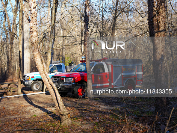 The Washington DC Fire Department battles a brush fire in Rock Creek Park, a National Park in Washington DC, on December 7, 2024. The fire b...