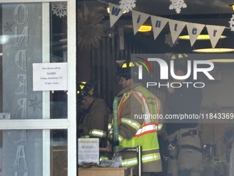 Fair Lawn Police and Fair Lawn Heavy Rescue respond to the Fair Lawn Public Library to rescue multiple people trapped inside an elevator at...