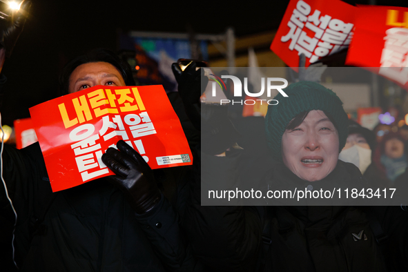 Citizens shed tears after the motion to impeach President Yoon Suk Yeol is rejected in the National Assembly. On December 7, 2024, nearly on...