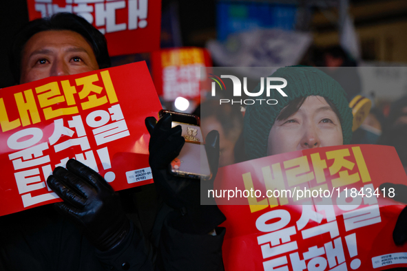 Citizens shed tears after the motion to impeach President Yoon Suk Yeol is rejected in the National Assembly. On December 7, 2024, nearly on...