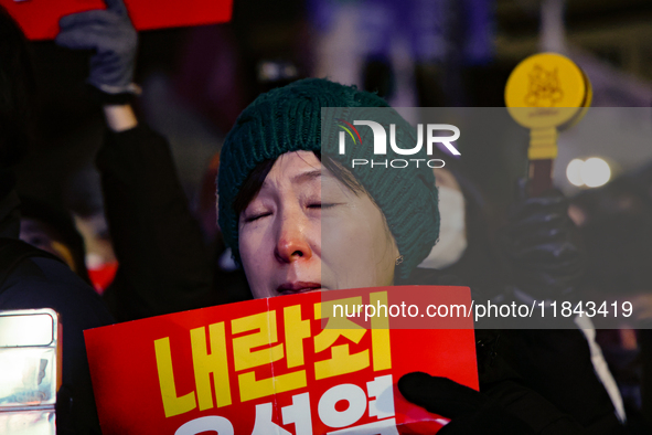 Citizens shed tears after the motion to impeach President Yoon Suk Yeol is rejected in the National Assembly. On December 7, 2024, nearly on...