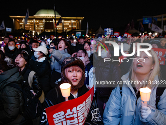 Nearly one million citizens gather in front of the National Assembly in Yeouido, Seoul, South Korea, on December 7, 2024, in support of impe...