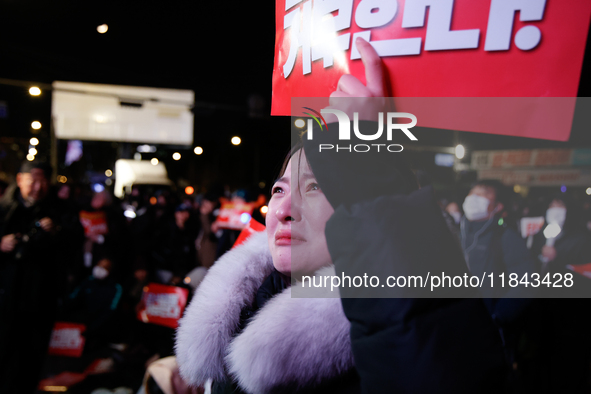 Citizens shed tears after the motion to impeach President Yoon Suk Yeol is rejected in the National Assembly. On December 7, 2024, nearly on...