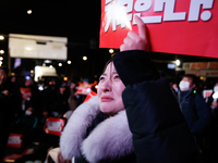 Citizens shed tears after the motion to impeach President Yoon Suk Yeol is rejected in the National Assembly. On December 7, 2024, nearly on...