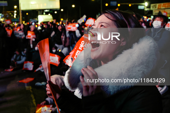 Citizens shed tears after the motion to impeach President Yoon Suk Yeol is rejected in the National Assembly. On December 7, 2024, nearly on...