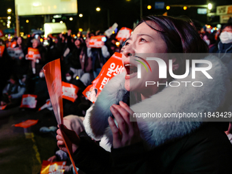 Citizens shed tears after the motion to impeach President Yoon Suk Yeol is rejected in the National Assembly. On December 7, 2024, nearly on...