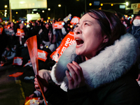 Citizens shed tears after the motion to impeach President Yoon Suk Yeol is rejected in the National Assembly. On December 7, 2024, nearly on...