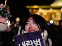 Citizens shed tears after the motion to impeach President Yoon Suk Yeol is rejected in the National Assembly. On December 7, 2024, nearly on...