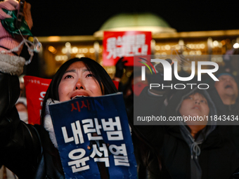 Citizens shed tears after the motion to impeach President Yoon Suk Yeol is rejected in the National Assembly. On December 7, 2024, nearly on...