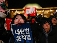 Citizens shed tears after the motion to impeach President Yoon Suk Yeol is rejected in the National Assembly. On December 7, 2024, nearly on...