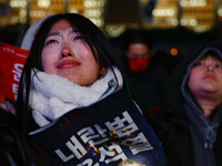 Citizens shed tears after the motion to impeach President Yoon Suk Yeol is rejected in the National Assembly. On December 7, 2024, nearly on...