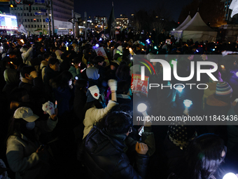 The police set up barricades and block access in front of the People Power Party's central headquarters. Nearly one million citizens gather...