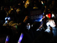 The police set up barricades and block access in front of the People Power Party's central headquarters. Nearly one million citizens gather...