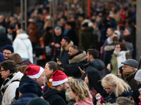 The entrance of the Cologne Dom Christmas Market in Cologne, Germany, on December 7, 2024, is completely packed with visitors. (